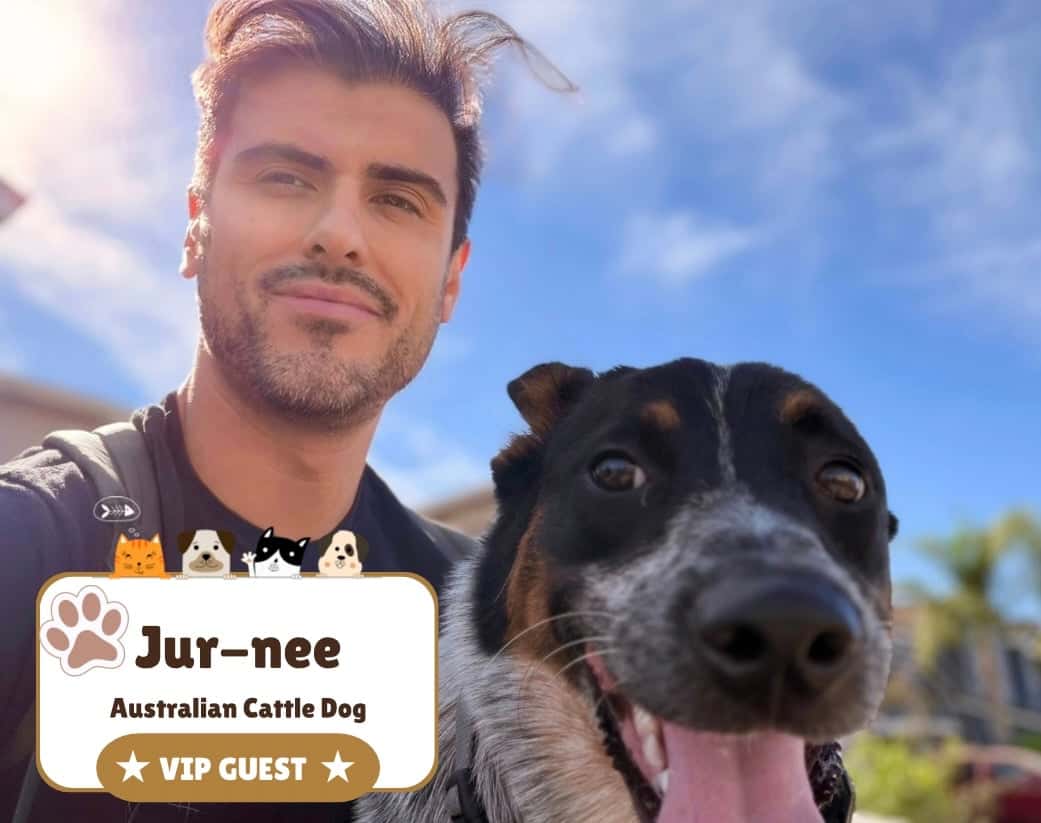 Tyler taking a selfie with Jur-nee, an Australian Cattle Dog, at the park